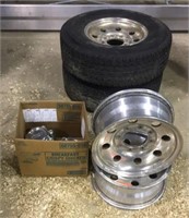 4- aluminum Ford wheels, center caps, and 2-