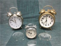 Three Alarm Clocks