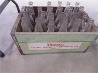 Sterling beverage crate w/ 23 bottles