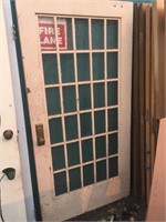 Heavy steel door with multi pain safety glass