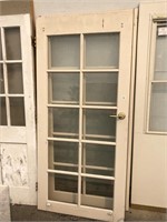 Pair of wood French doors with hardware glasses