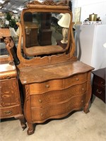 Antique oak dresser, serpentine front, claw