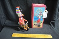 SCHYLLING COLLECTOR REPLICA DUCK ON BIKE WIND UP T