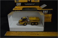 CAT 730 ARTICLUATED TRUCK WITH KLEIN WATER TANK