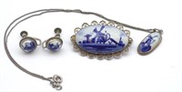 Silver delft jewellery group.