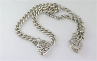 Two silver bracelets with heart locks