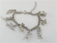 Silver charm bracelet with 9 Australian charms
