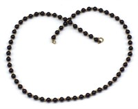 Onyx and gold bead necklace
