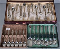 Three cased sets silver plate spoons