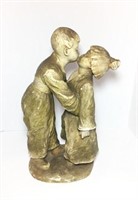 Resin Boy Kissing Girl Statue