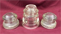 Group of 3 clear glass insulators