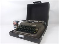 Machine à écrire Smith-Corona dans sa malette