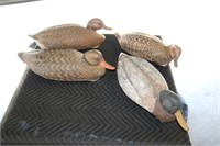 Four cork hunting decoys 3 hens and 1 drake 1 is