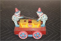 Wyandotte Hoky Poky tin wind up toy