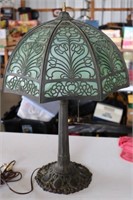 Green slag glass lamp with couple pieces slag