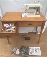 Singer Sewing Machine with Cabinet and Supplies