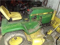 JD 318 lawn tractor w/ 48” deck & frt. mtd. snow b