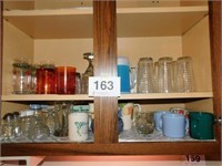 Variety of drinking items: wine glasses - mugs -