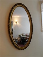 Decorative oval resin framed mirror, 35" x 20"
