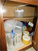 Large assortment of plastic storage containers -