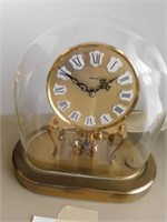 Kundo anniversary clock with glass dome