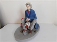 Ceramic hobo with dog, cooking hotdogs
