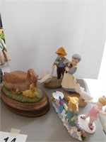 Ceramic figurines: boy with goose - girl with