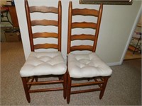 Two ladder back chairs with woven seat, white