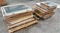 Two pallets of wooden framed windows
