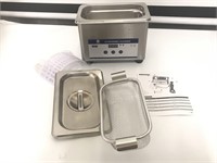 Ultrasonic cleaner-needs a power cord 

Appears