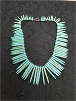Turquoise colored necklace
