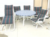 Patio table, chairs and matching lounger
