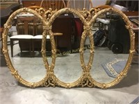 Huge gold framed triple oval hanging mirror