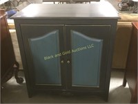 Large painted wooden cabinet with shelves