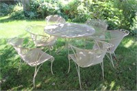 Wrought iron patio set with six chairs