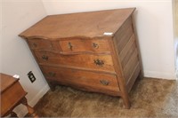 Oak serpentine dresser