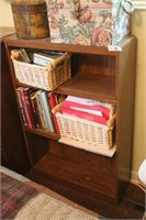 Wood bookcase with contents