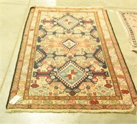 Lot 1392 - Hand made oriental rug (83” x 46”)