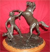 Bronze "Saddling a Bronc" by Earl W. Bascom