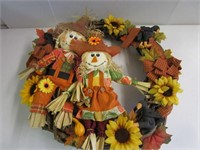 Fall grape vine wreath with Mr. & Mrs. Scarecrow