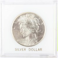 Coin 1927  Peace Silver Dollar Brilliant Unc.