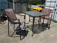 Bar height glass top patio table and chairs