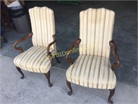 Two upholstered high back chairs