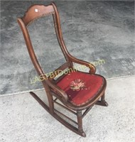 Antique Woven back rocking chair