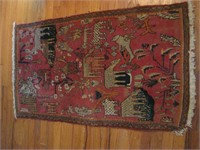 4' x 2'3” wool hand knotted animal motif