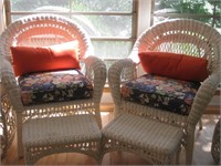 Pair of White Wicker chairs with foot rests &