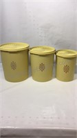 Set of three Tupperware canisters