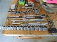 Large assortment of hand tools including sockets,