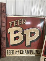 Feed BP Feed of Champions tin sign