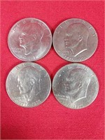Four Eisenhower Dollars